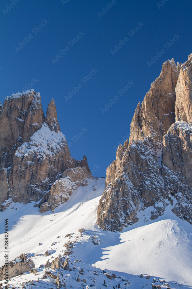 Sassolungo and Cinquedita covered in Snow. the Sasso lungo, Langkofel is located in the Dolomites and a famous Tourist destination