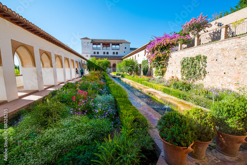 Gardens in Alhambra palace in Granada in a beautiful summer day, Spain