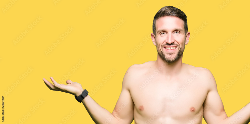 Handsome shirtless man showing nude chest Smiling showing both hands open palms, presenting and advertising comparison and balance