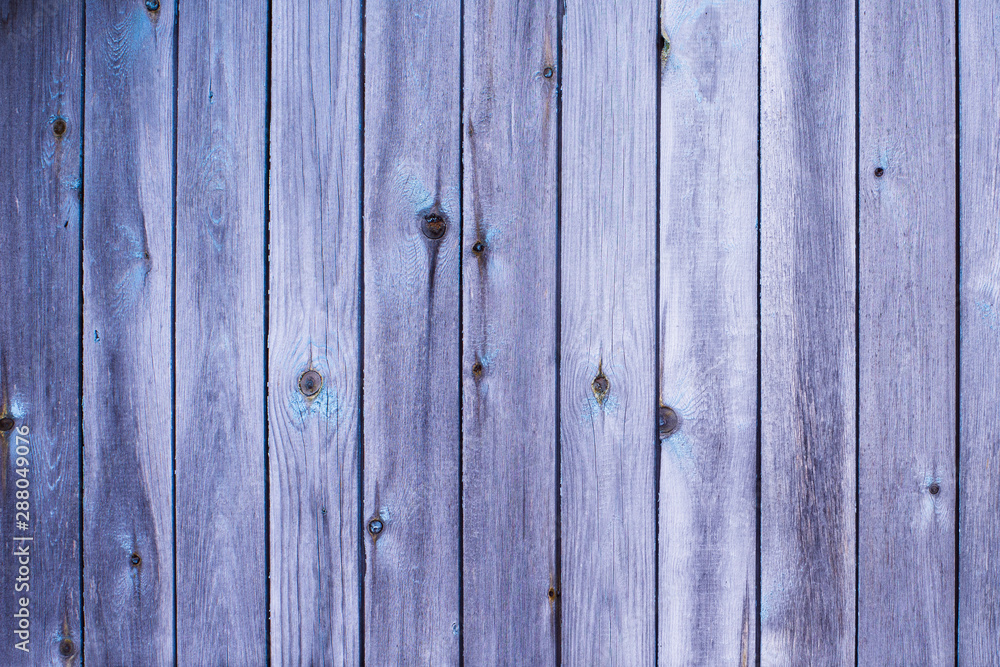 Naklejka premium Blue wooden wall from boards close up. Vintage stained wooden wall background texture