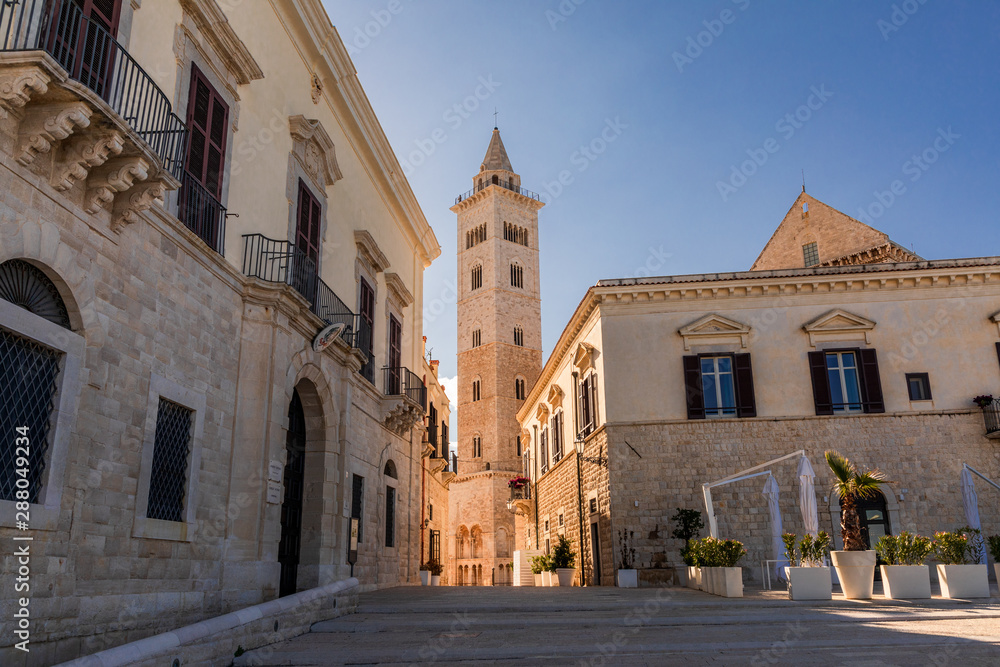 Italy, Apulia, Province of Barletta-Andria-Trani, Trani. View down a street to San Nicola Pellegrino cathedral