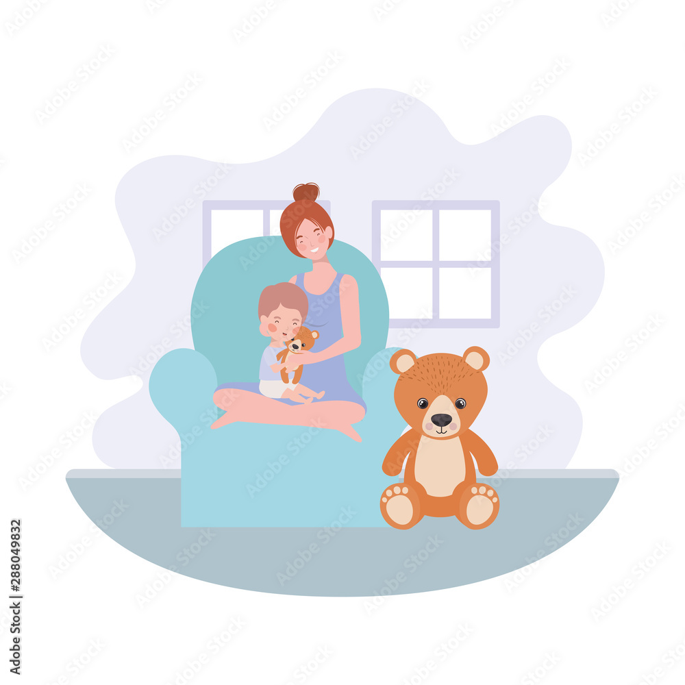 cute pregnancy mother with little boy seated in sofa cute pregnancy mother with little boy seated in sofa