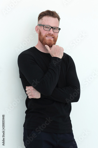 handsome man a man in a black sweater. isolated on white