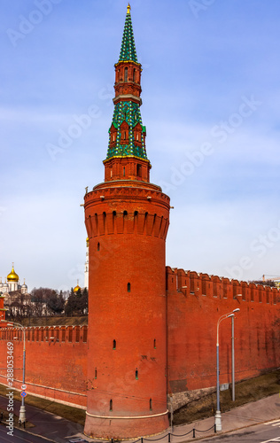 Vertical view at Kremlin Vodovzvodnaya Tower and surrounding walls, blue sky with white clouds, Moscow, Russia