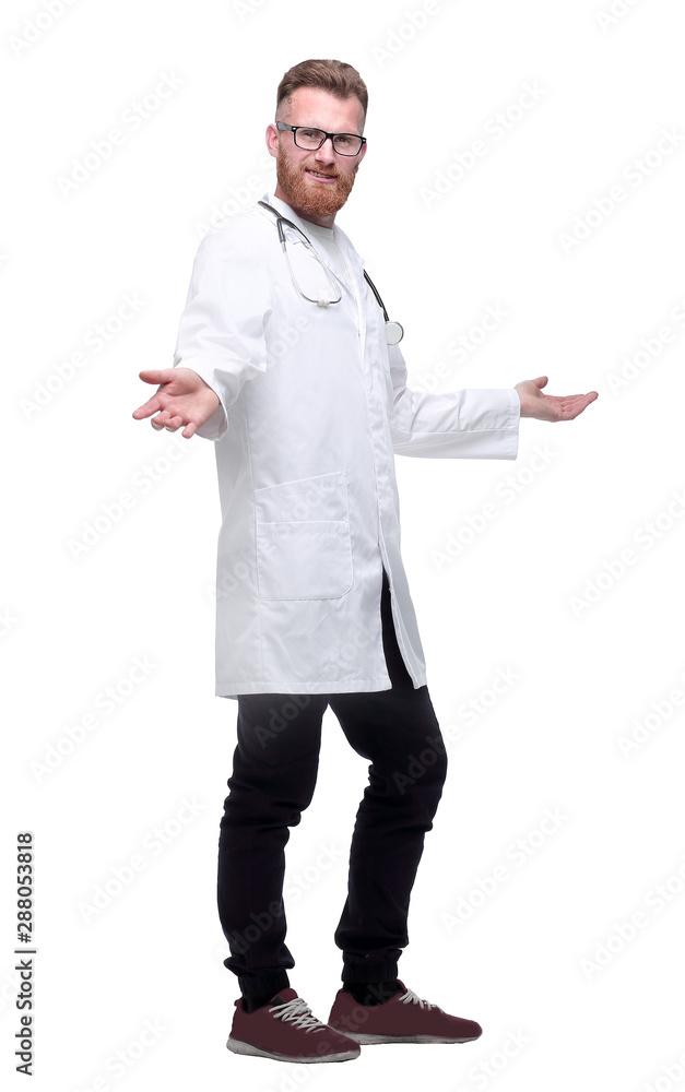 in full growth. friendly doctor with stethoscope inviting you in full growth. friendly doctor with stethoscope inviting you
