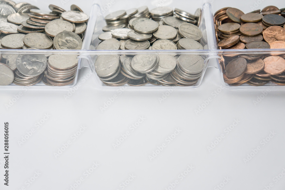 Financial planning concept background with organized loose change Financial planning concept background with organized loose change