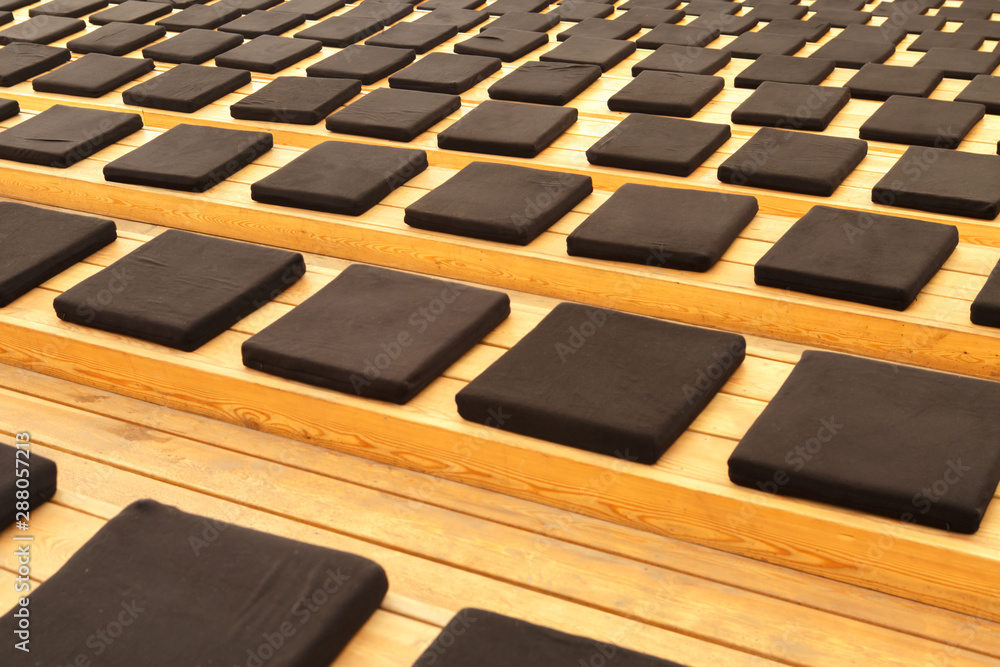 Fototapeta premium Ottomans seats on wooden stairs