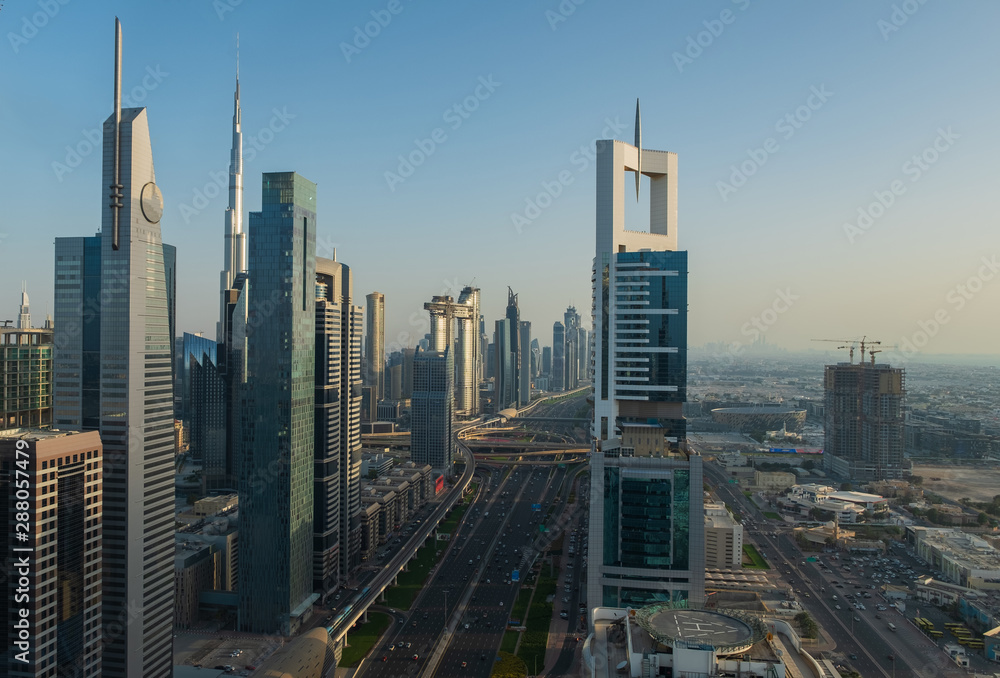 Dubai from above(43th floor). Dubai skyline on sunset. United Arab Emirates, may 2019