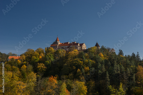 Landscape view on the gothic Castle Pernstejn during autumn time - Czech Republic