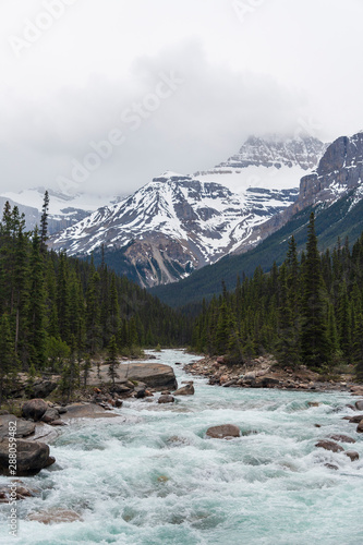 Alpine river being feed by a glacier in the Rocky Mountains, Canada. © ggw