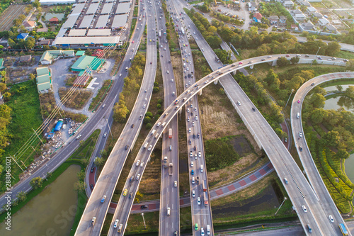 Aerial view transport junction road car movement with sunset light