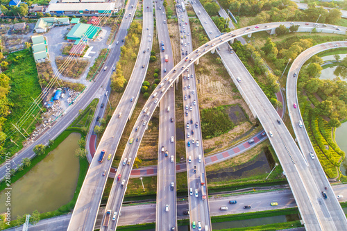 Aerial view transport junction road car movement with sunset light