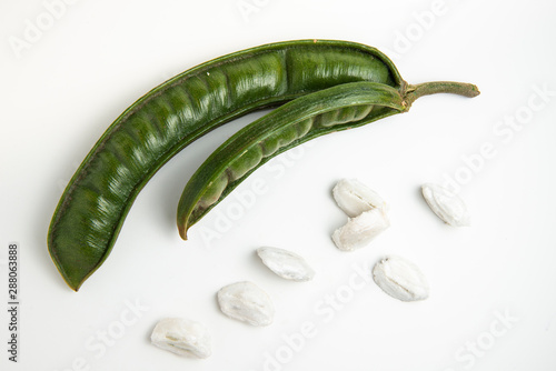 Guaba or cuaniquil: fresh South American fruit on white background photo