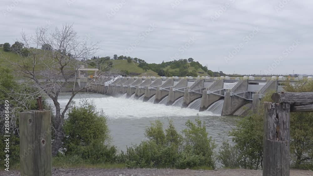 Nimbus Dam American River Water Release Folsom California (wide shot, color graded) Nimbus Dam American River Water Release Folsom California (wide shot, color graded)