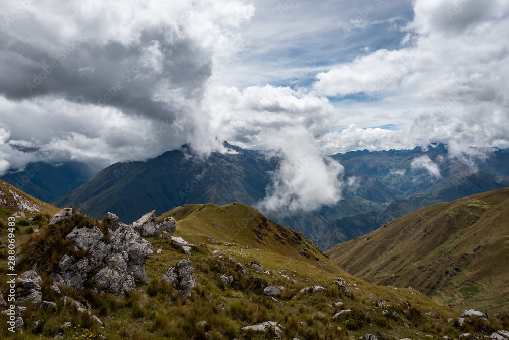 In the Sacred Valley, near Ollantaytambo the clouds dance between the rocky mountain edges like an orchestra in the sky In the Sacred Valley, near Ollantaytambo the clouds dance between the rocky mountain edges like an orchestra in the sky