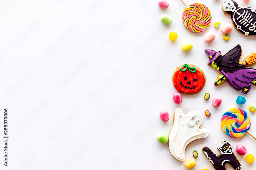 Creepy cookies for halloween treat frame on white background top view space for text