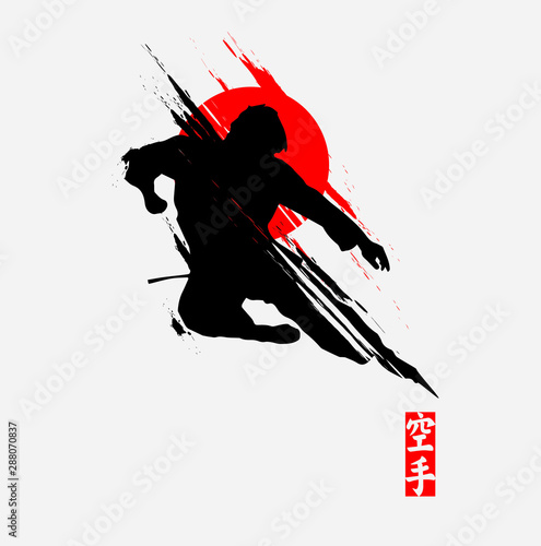 Martial arts silhouette character logo illustration. Foreign word in japanese means Karate.	