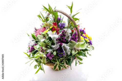 Basket with flowers Isolated on a white background. Object for the design of greeting cards