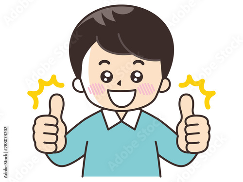 サムズアップする若い男性