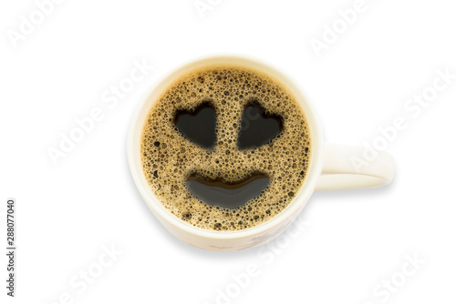 coffee with a heart of foam on white background
