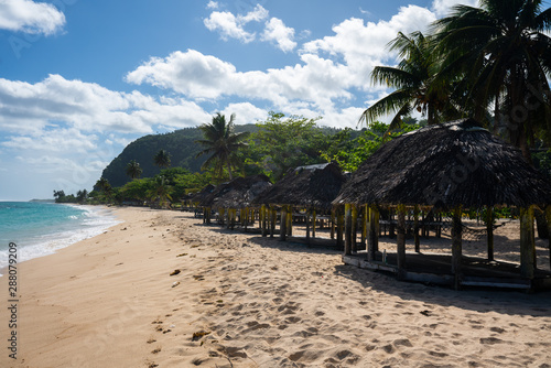 Beach fale's on a white sand beach on Lalomanu, Samoa