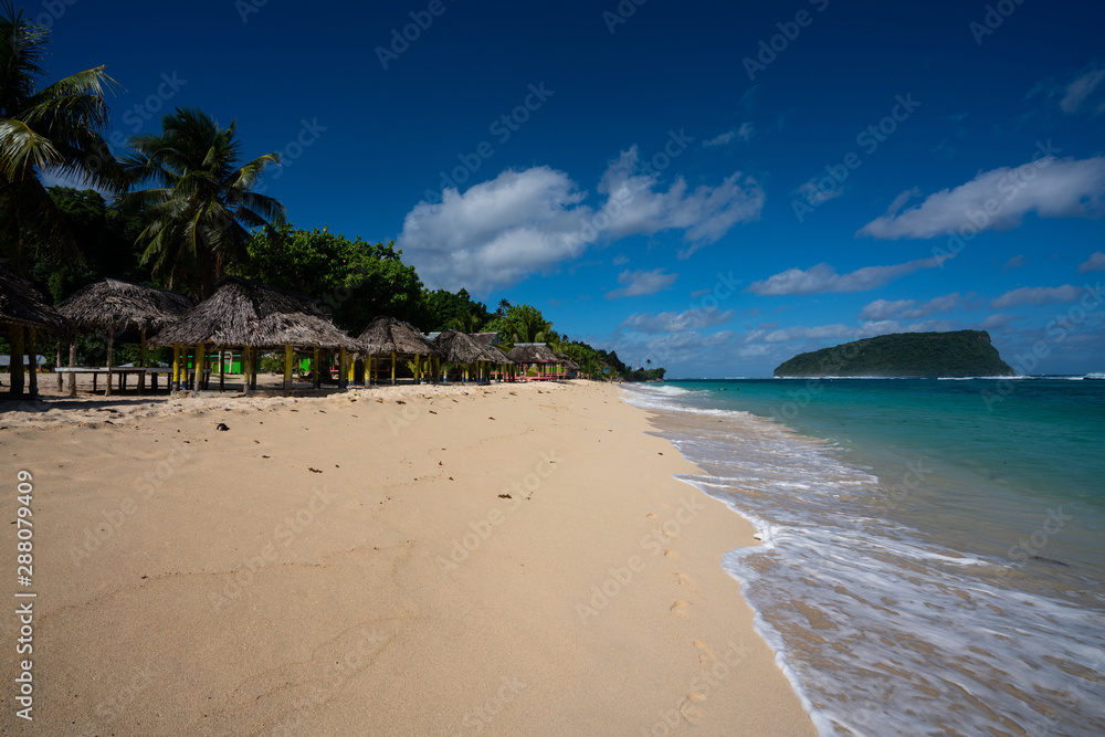Beach fale's on a white sand beach on Lalomanu, Samoa