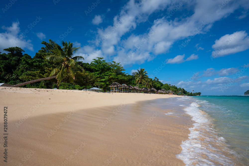 Tropical white sand beach at Lalomanu in Samoa