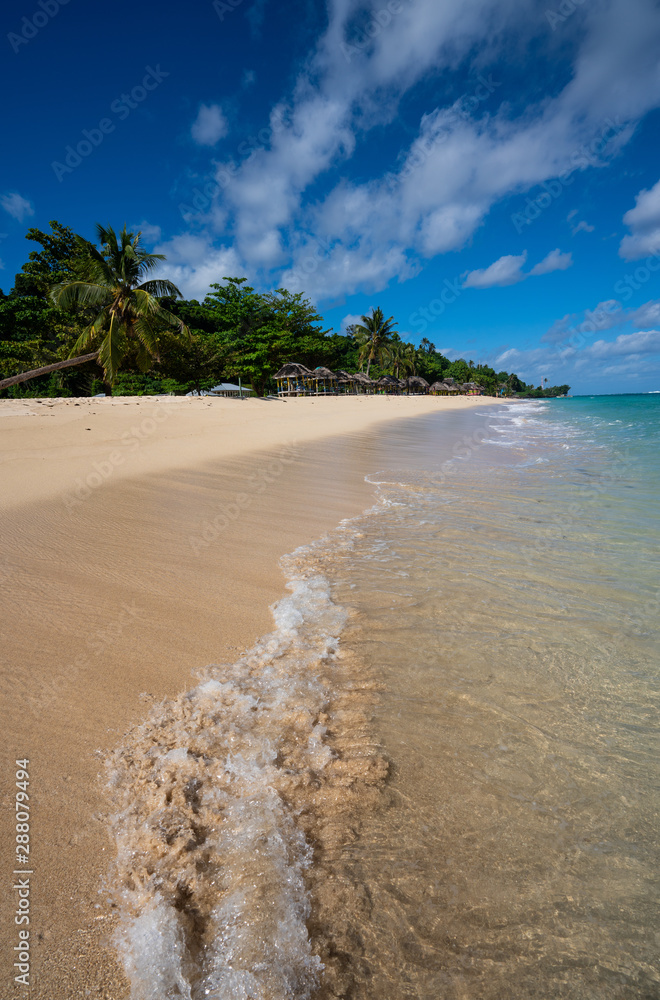 Tropical white sand beach at Lalomanu in Samoa
