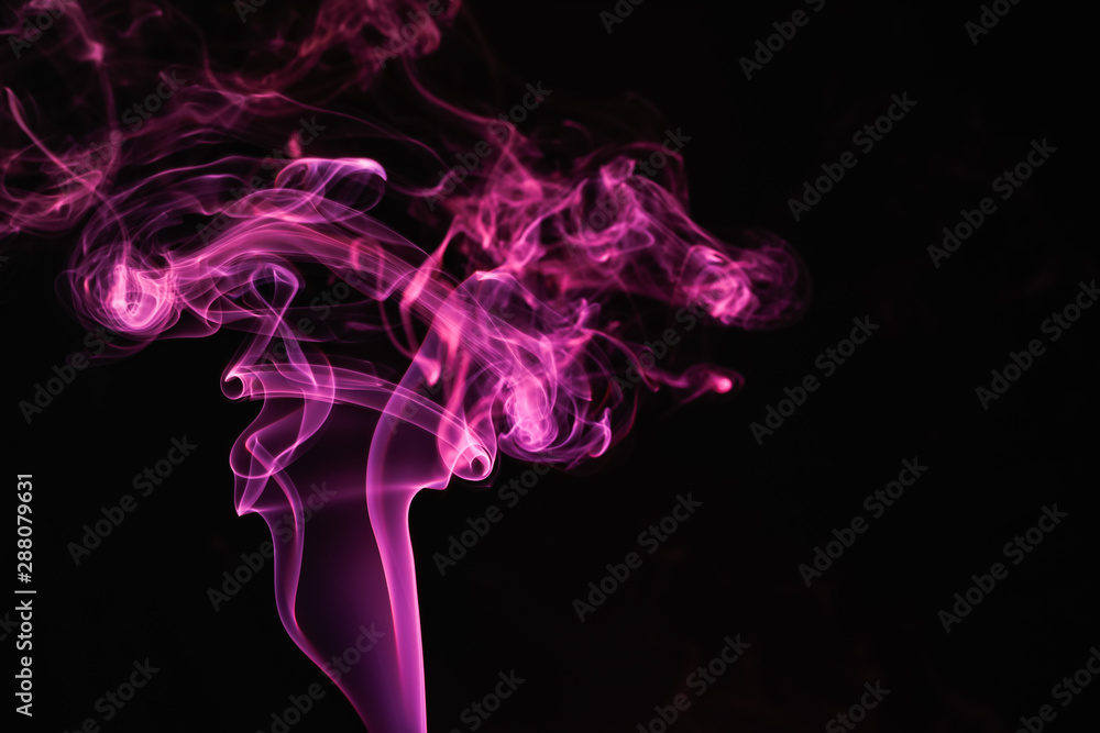 Obraz premium Incense stick smock on dark background 