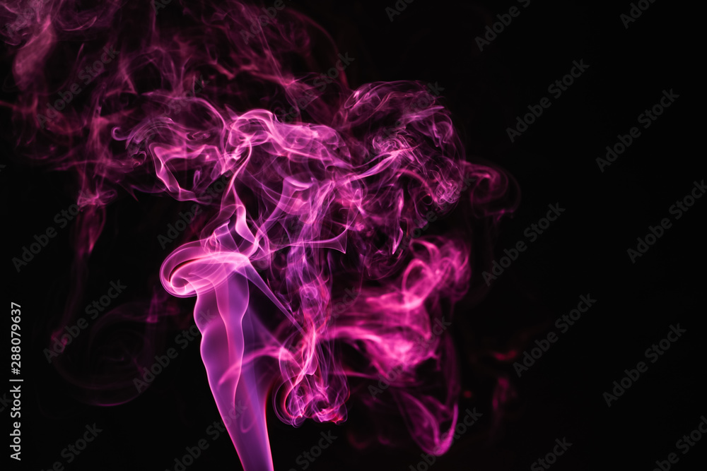 Obraz premium Incense stick smock on dark background 