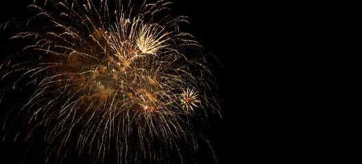 Festive fireworks on black background.