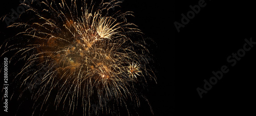 Fotografie, Obraz Festive fireworks on black background.