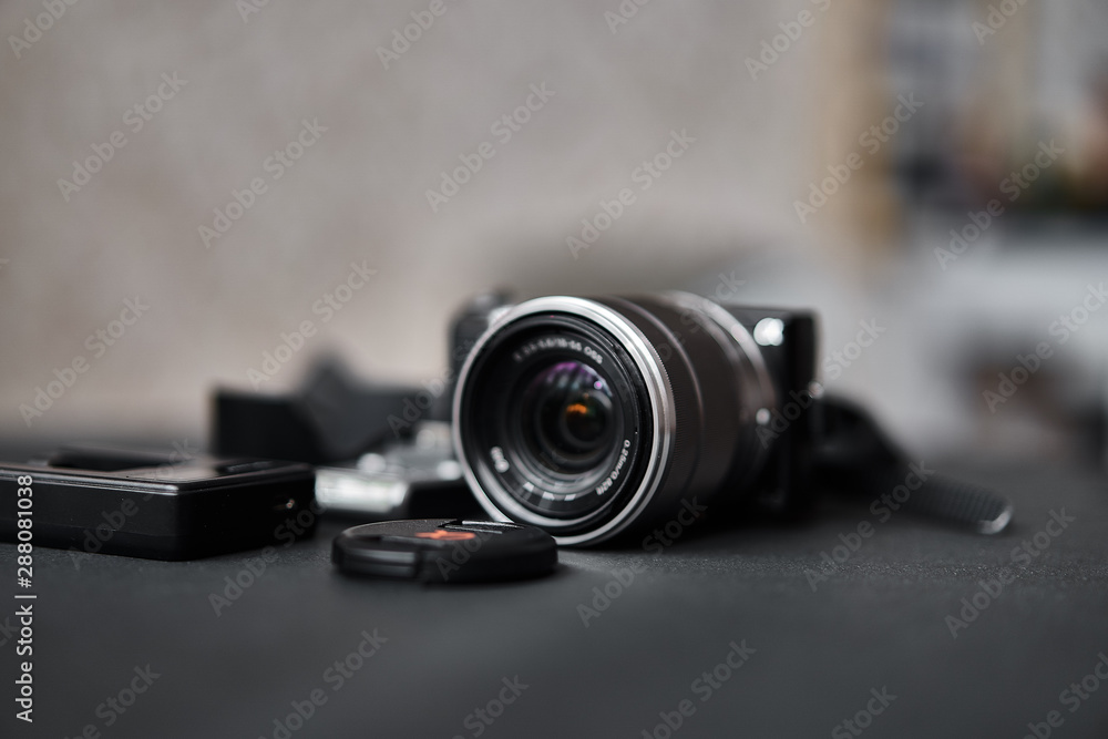 Camera lens on black table