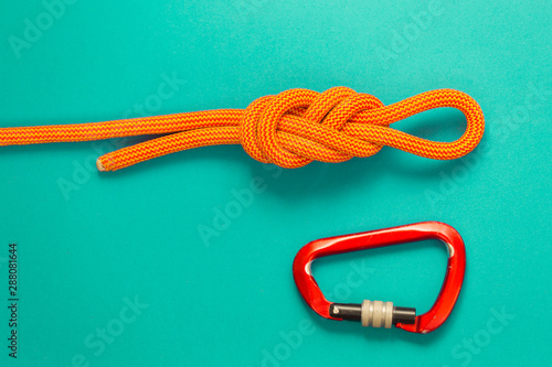 Carabiner and knot from a climbing rope.