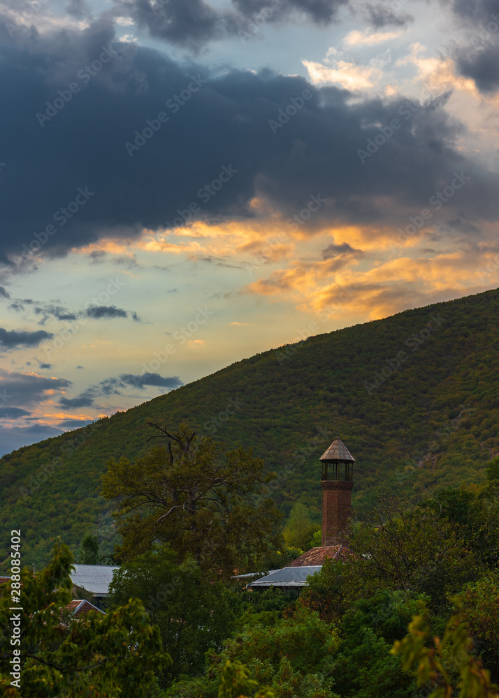 View of the old minaret at sunset time