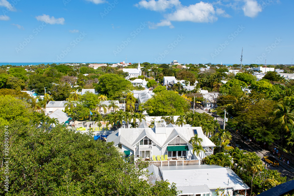 he historic and popular center and Duval Street in downtown Key West. Beautiful small town in Florida, United States of America. With colorful houses.