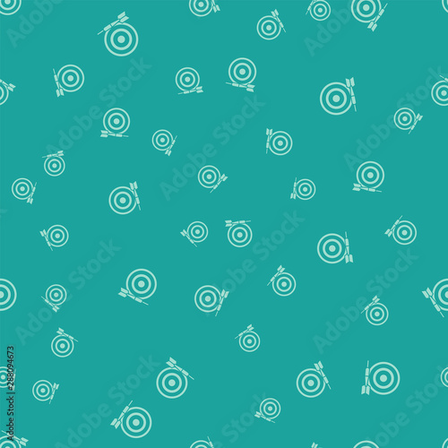 Green Classic dart board and arrow icon isolated seamless pattern on green background. Dartboard sign. Game concept. Vector Illustration