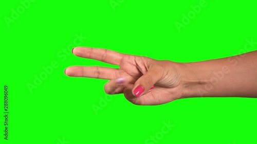 Closeup view of beautiful female one hand counting from 0 to 5 using fingers.  Woman holds hand horizontaly and shows fist first, then one, two, three, four, five fingers. Manicured nails. 4k photo