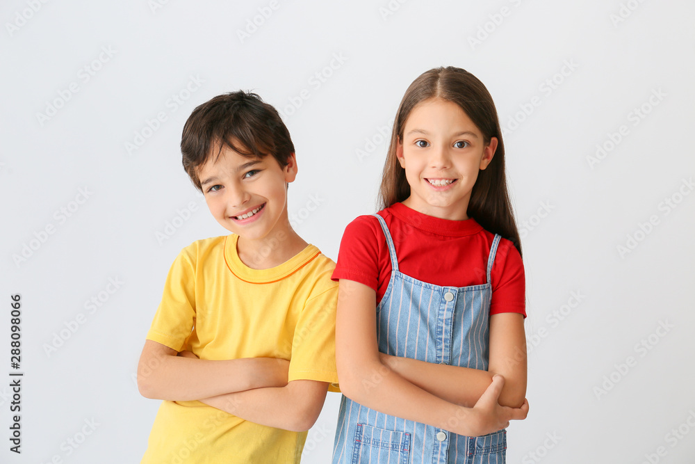 Portrait of cute children on light background Portrait of cute children on light background