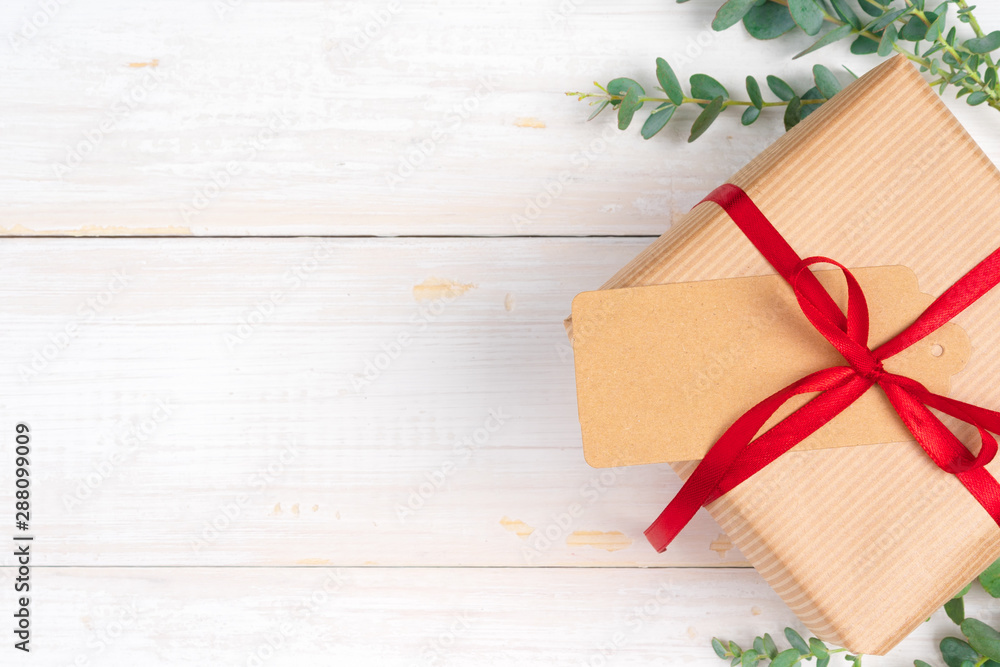 Christmas composition with Christmas gift on wooden background Christmas composition with Christmas gift on wooden background