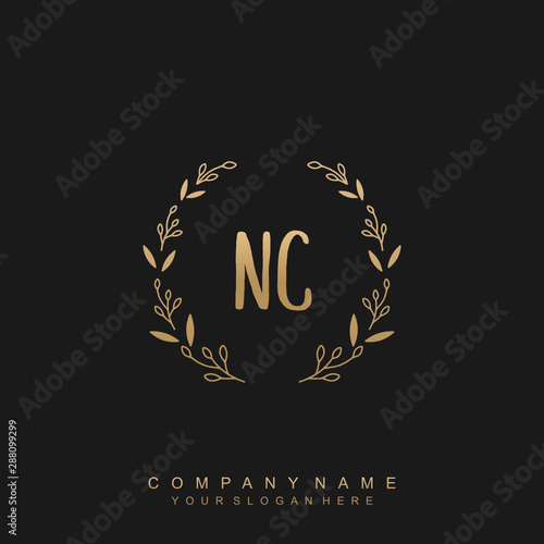 letter NC surrounded by beautiful and elegant flowers and leaves. Wedding monogram logo template.