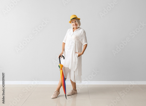 Stylish mature woman with u...