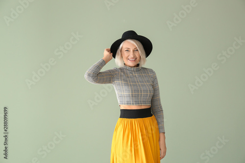 Stylish mature woman on col...