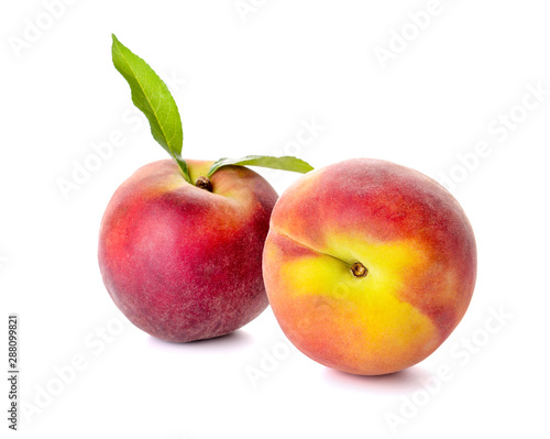 Ripe peaches on white background