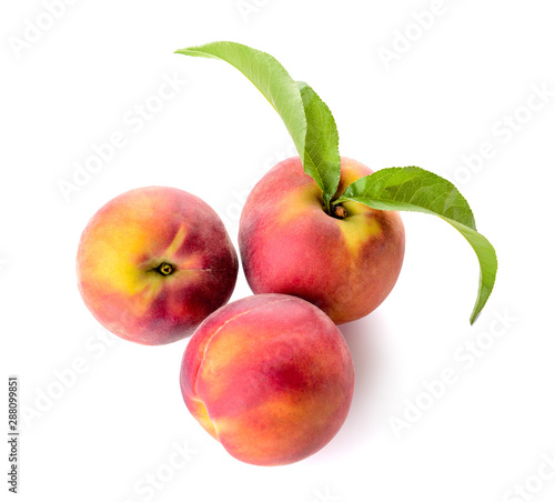 Ripe peaches on white background