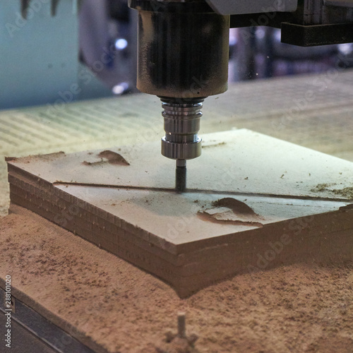 Processing of panels on the coordinate-milling woodworking machine with CNC.