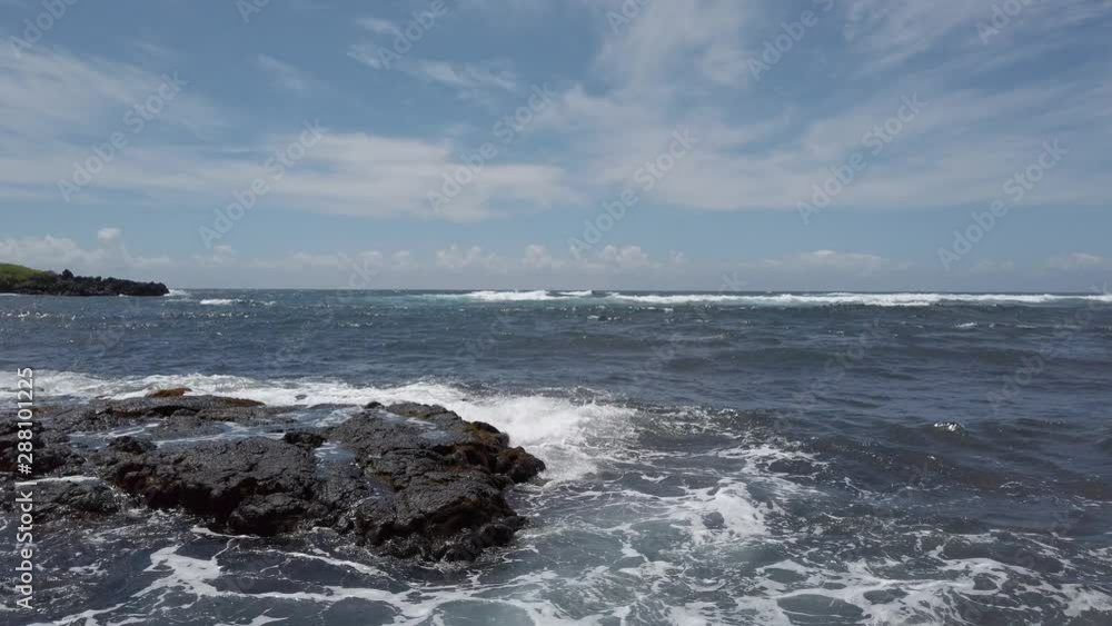Waves splashing on rocky beach slow motion Waves splashing on rocky beach slow motion