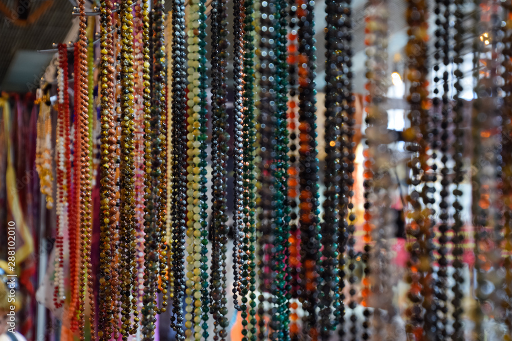 Indian beads and jewelry on the counter in store. Indian beads and jewelry on the counter in store.