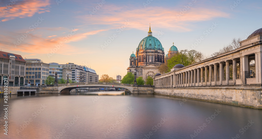 Berlin skyline with Spree river at sunset twilight