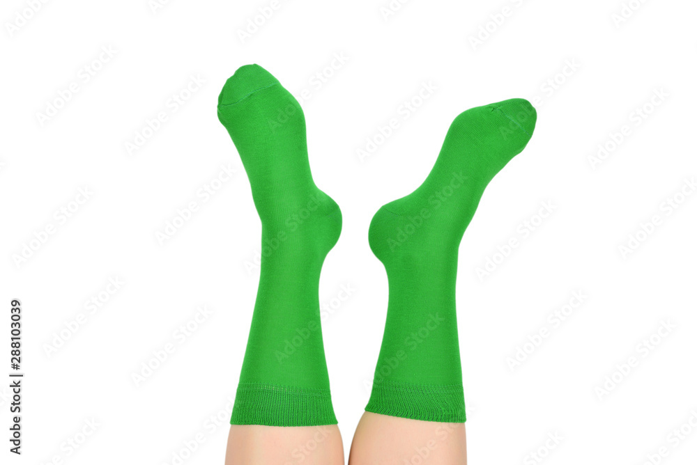 Woman in green socks isolated on white background. Top view. Woman in green socks isolated on white background. Top view.